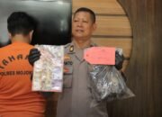 Polres Mojokerto akhirnya meringkus AT (27), preman kampung yang menjadi buronan pasca mengeroyok 2 pegawai PLN di Dusun/Desa Kedungmaling, Kecamatan Sooko, Mojokerto.