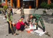 TNI dan Warga Trowulan Gelar Karya Bakti Prima di Masjid Darul Muttaqin, Wujud Kepedulian dan Kebersamaan