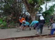 Satgas TMMD dan Warga Tetap Semangat Lanjutkan Pengecoran Jalan Usaha Tani di Tengah Hujan