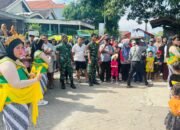 Satgas TMMD ke-126 Kodim 0815/Mojokerto Amankan dan Meriahkan Festival Pesta Rakyat di Sumbertanggul