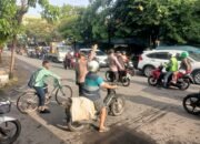 Anggota Polresta Sidoarjo Setiap Pagi Melayani Masyarakat Penguna Jalan