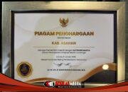 Pemkab Asahan Terima Penghargaan UHC 2026 Kategori Madya