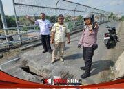 Wakapolsek Tanggulangin Bersama Satpol PP Sigap Tangani Jalan Berlubang di Fly Over Wates