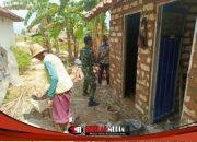 Satgas TMMD 127 Plester Dinding MCK Warga Mandala