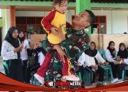 Senyum Polos Anak-Anak Kesongo, dan Sentuhan Hangat Anggota Satgas di Sela TMMD 129 Bojonegoro