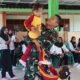 Senyum Polos Anak-Anak Kesongo, dan Sentuhan Hangat Anggota Satgas di Sela TMMD 129 Bojonegoro
