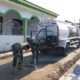 Menjaga Asa di Depan Rumah Ibadah: Kala Satgas TMMD 129 Bojonegoro Setia Merawat Jalan Desa Kesongo