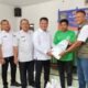 Wakil Bupati Asahan Salurkan Bantuan Beras Pemerintah Pusat di Desa Gajah Sakti